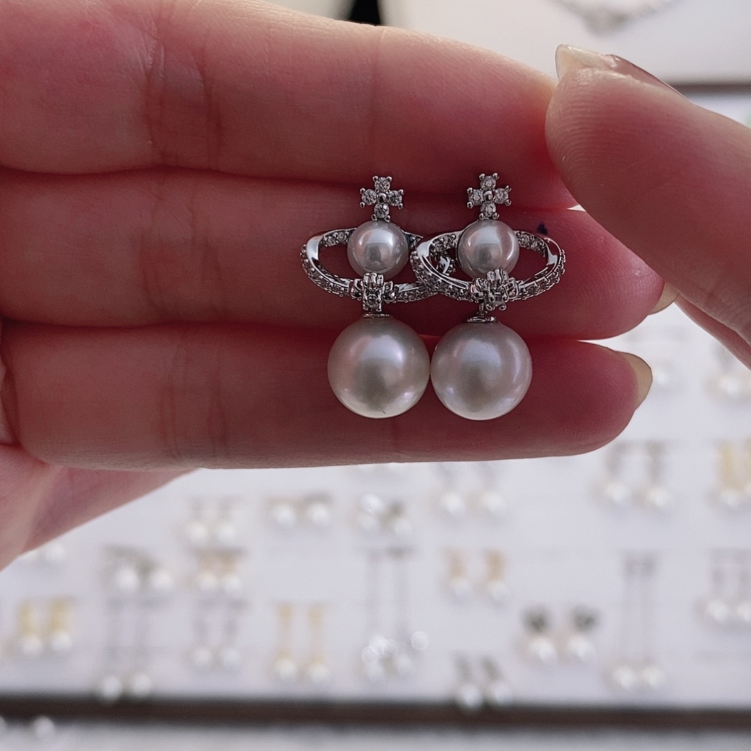 巧***干耳饰合金淡水珍珠