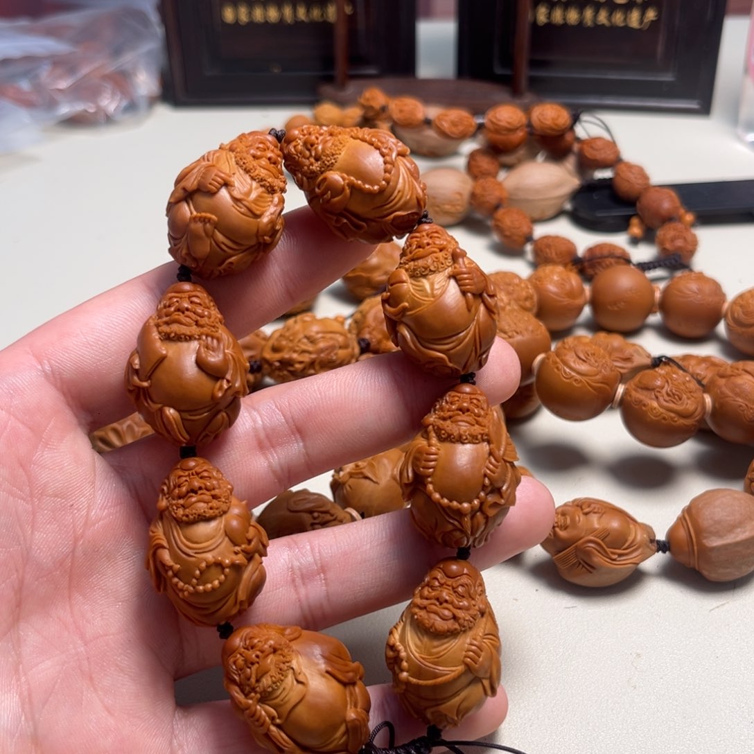 橄榄核吊坠E***橙整身达摩