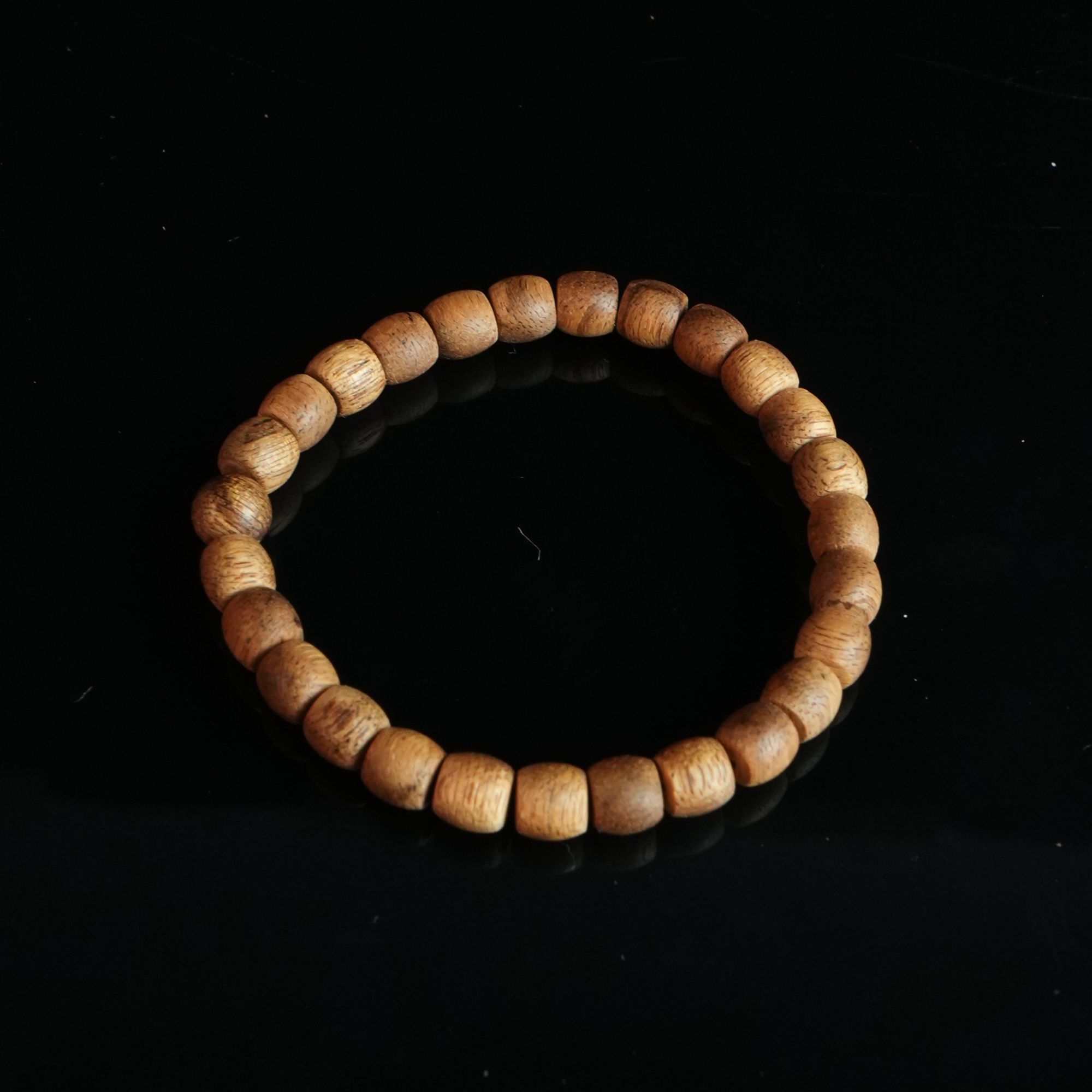 3189柬埔寨虎斑棋8分沉筒珠0.6x0.65cm  2.51g