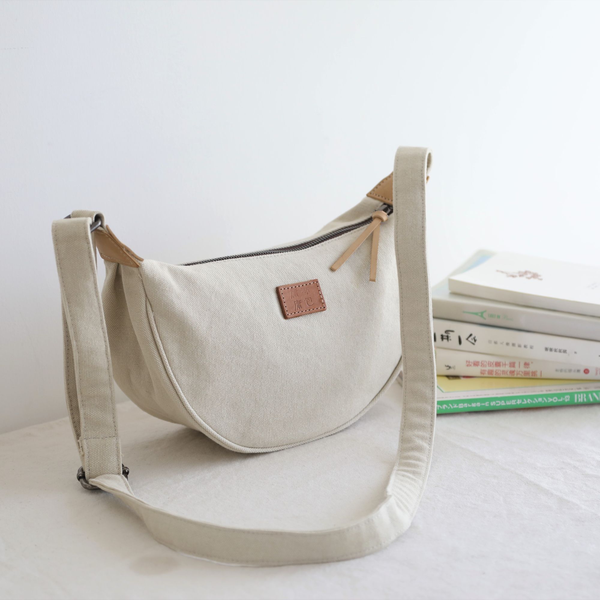 庸庸文艺小布包百搭原创饺子包女斜挎帆布包时尚休闲日系单肩包