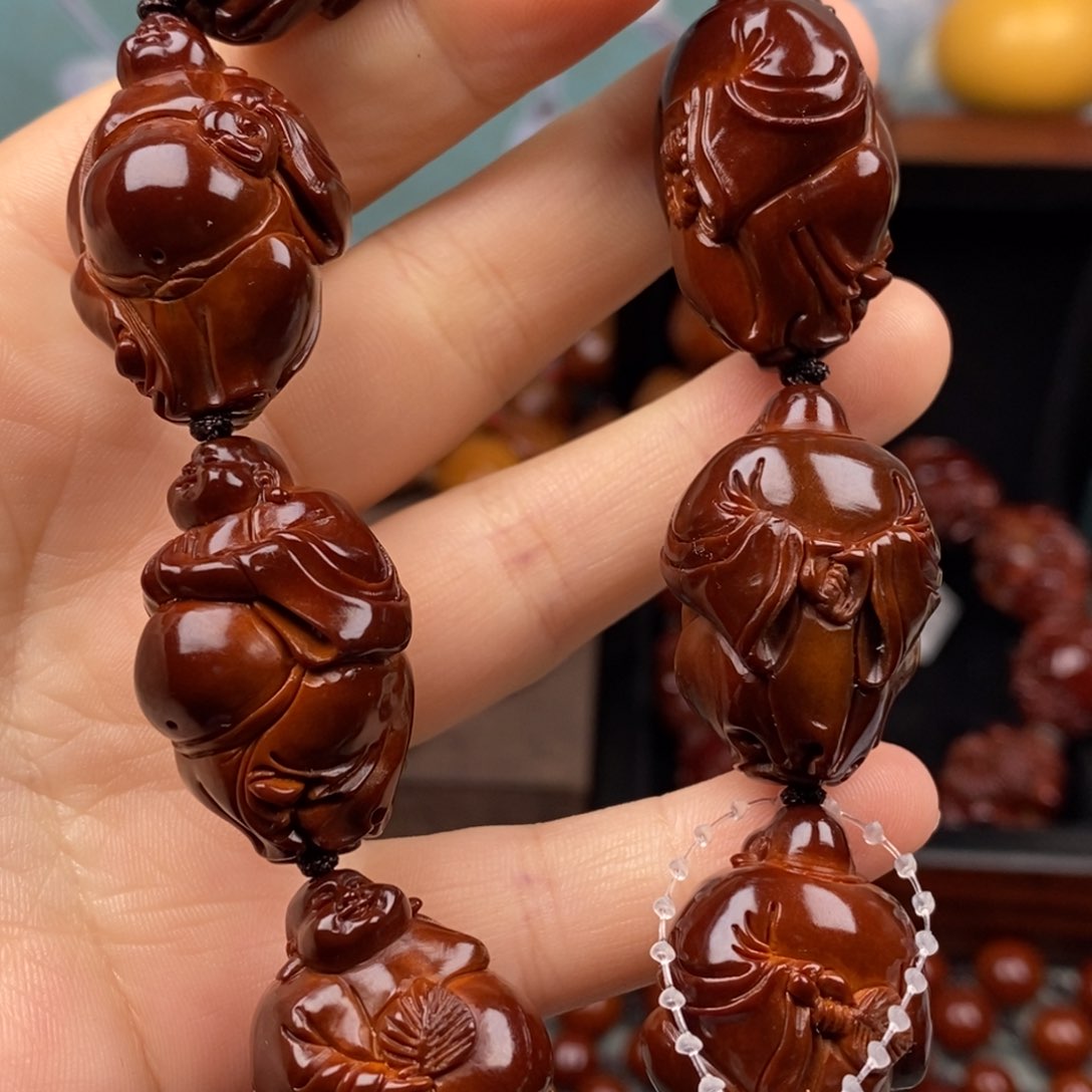 橄榄核吊坠铮**崋橄榄核