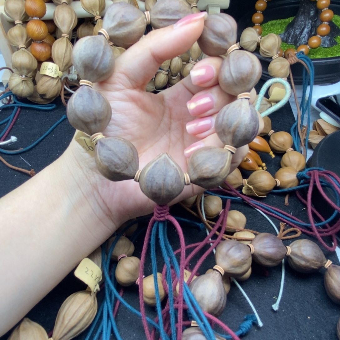 杨***震橄榄核手串/手链2226三花紫皮10颗