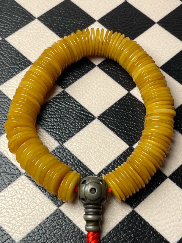 藏传文化薄片骨头手持