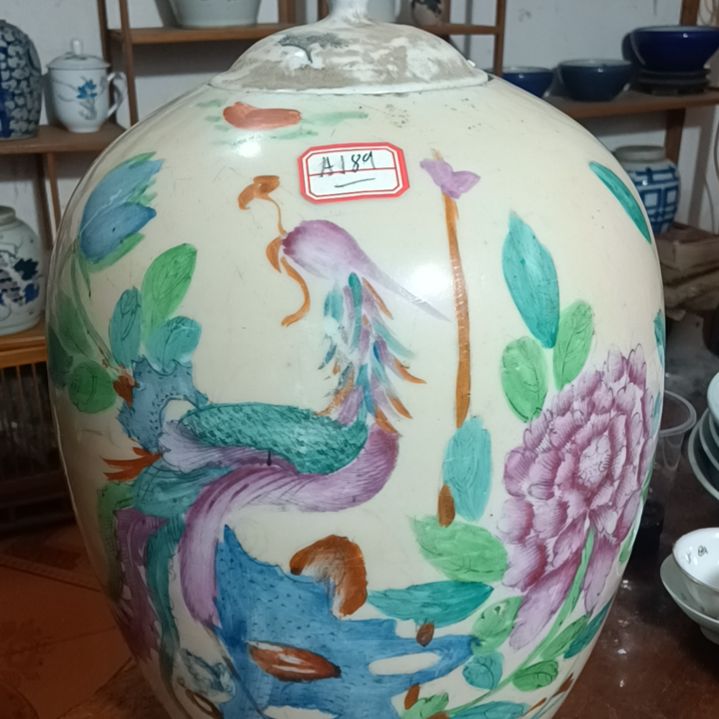 与***同粉彩花鸟罐子有点小飞釉