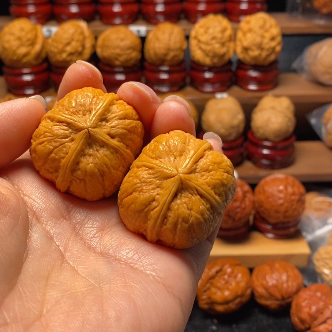 我***毛文玩核桃把件金猛四棱39尺