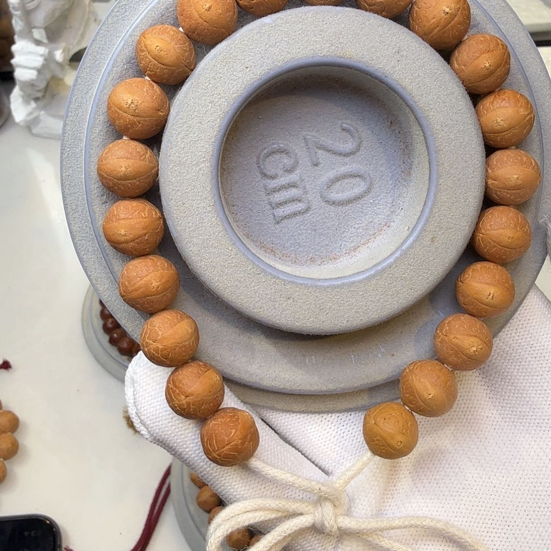 辣****吊坠凤眼菩提11.8-12.1紫红皮