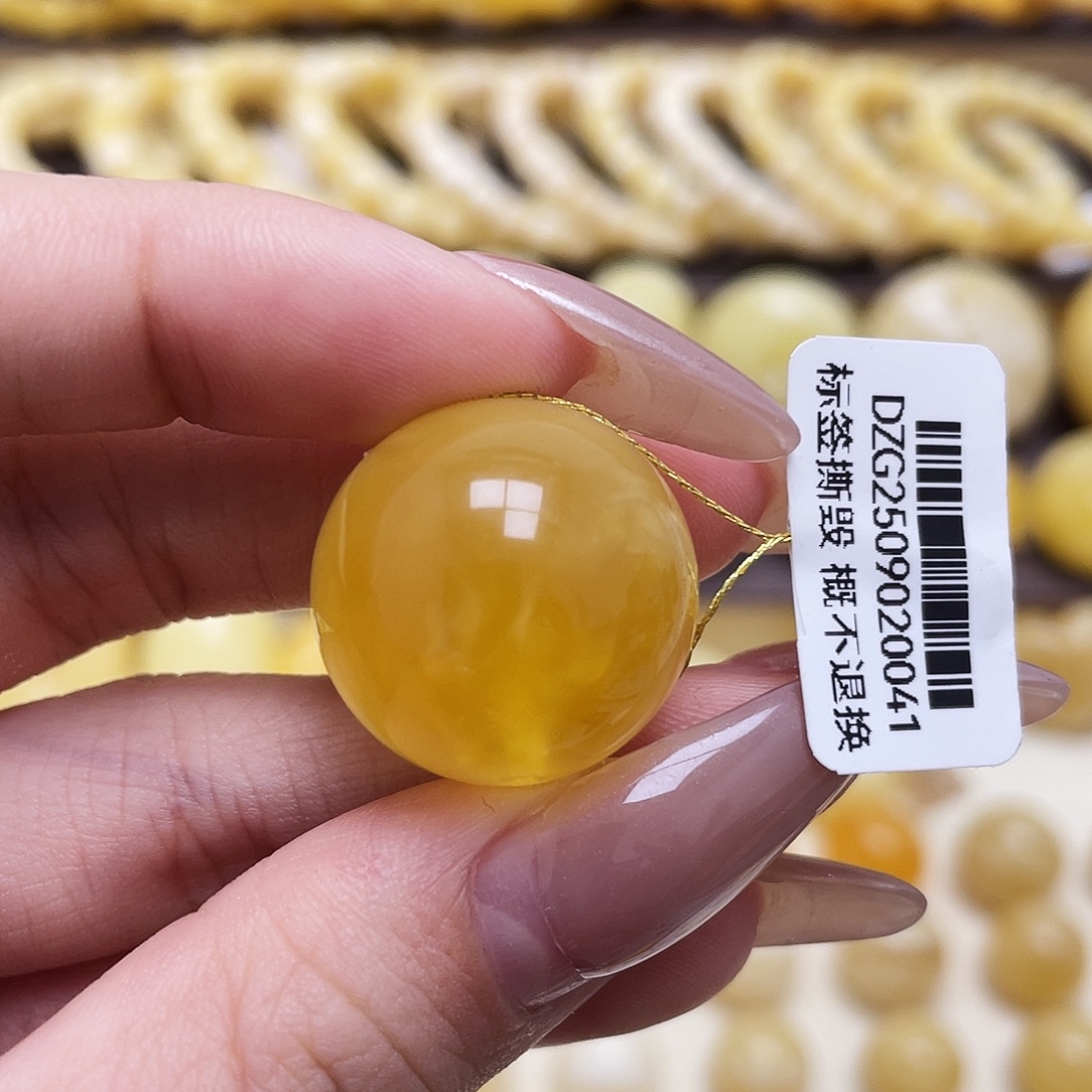 畅***吃琥珀未镶嵌裸石21.4mm圆珠瑕