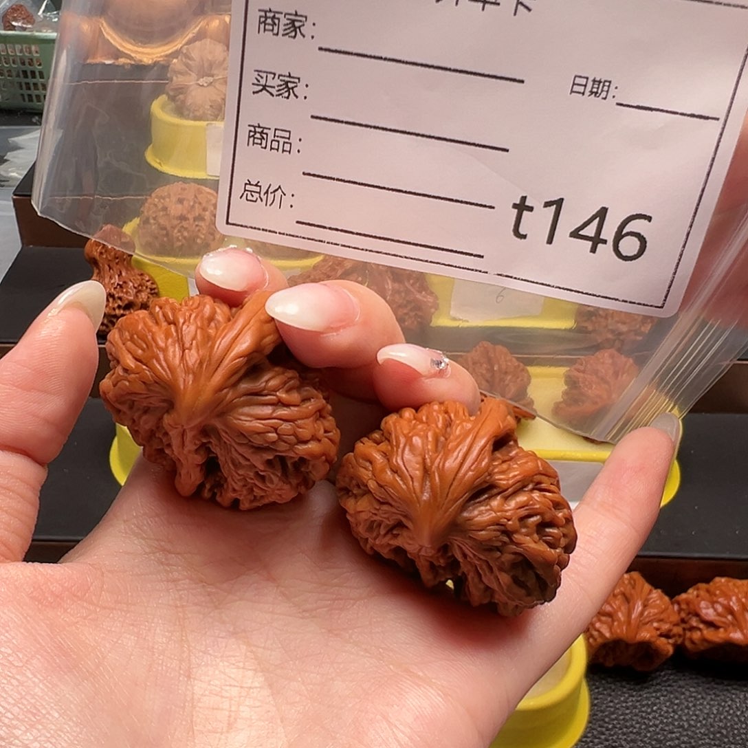 疯***瓜文玩核桃手把件半壁