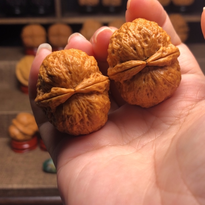 把件橄榄核33玉面鹦鹉35
