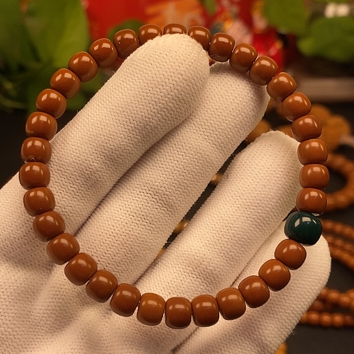 橄榄核手串6.7老挝核尖极限弧单圈微白回血串