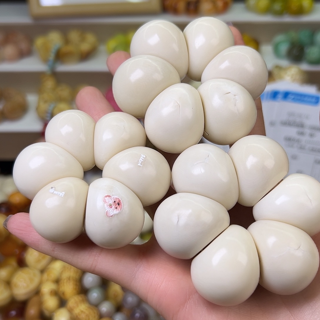 菩提根/象牙果手串瑕疵卡27左右白蒜瓣一串有裂