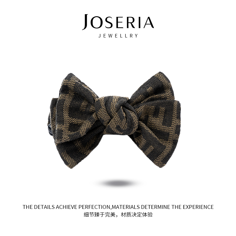 韩版东大门黑咖蝴蝶结香蕉夹FJ0205