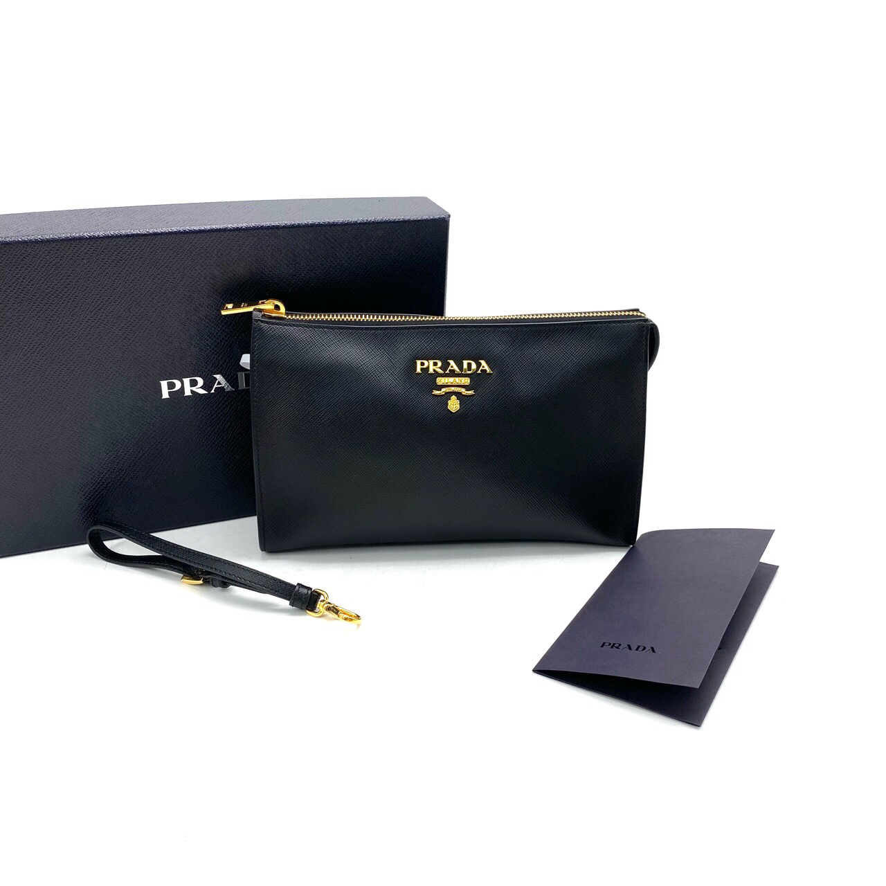 99新 Prada/普拉达 未使用黑色全皮小号手拿包 尺寸22/14