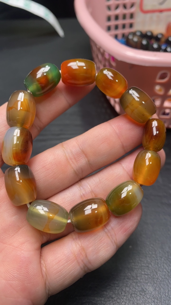 D 548 孔雀桶珠手串