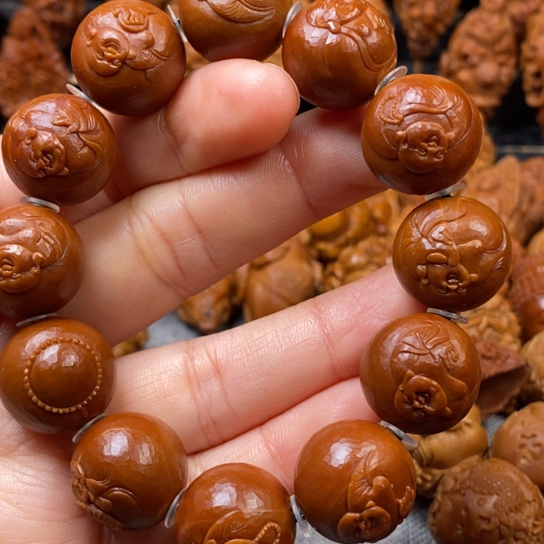 橄榄核手串/手链1.7细闪钻石面 正圆光珠薄意雕弥勒佛手串