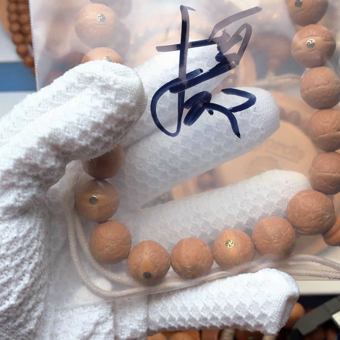 摄***哲凤眼菩提手串镶嵌