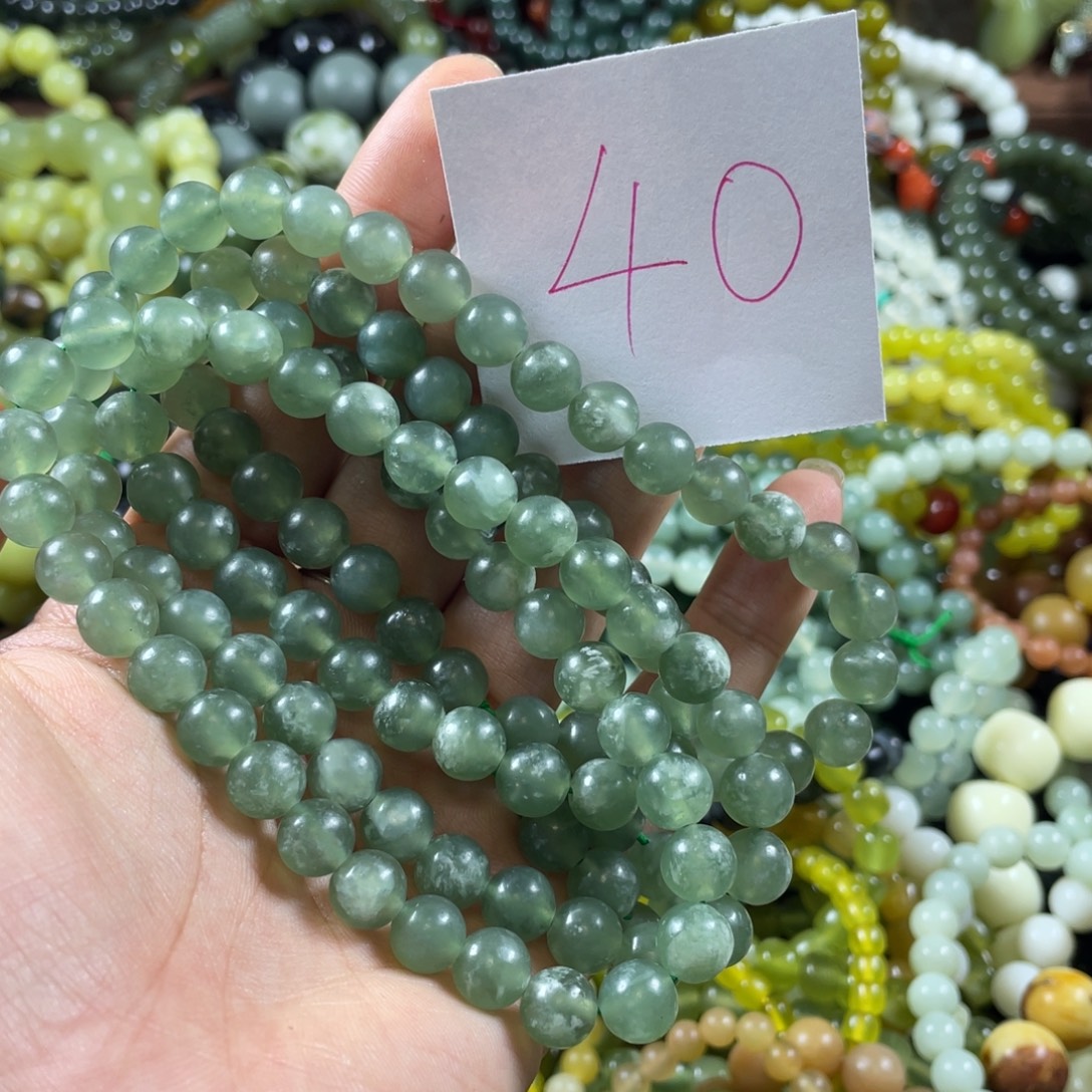 喵***宝未镶嵌蛇纹石玉手链