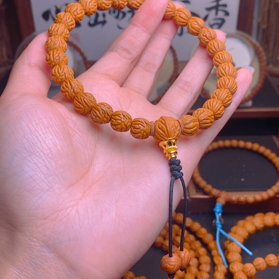 往***6桃核手串龙文桃核