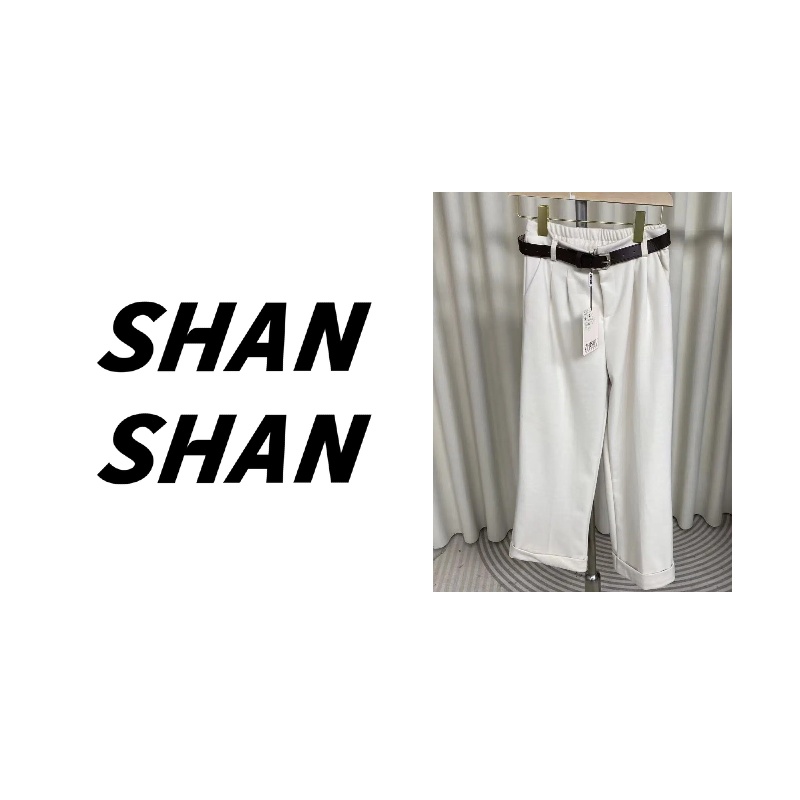 8930杏色带腰带裤腿卷边羊绒裤