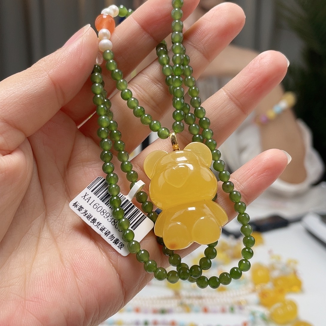 18K金镶嵌琥珀裸石蜜蜡吊坠