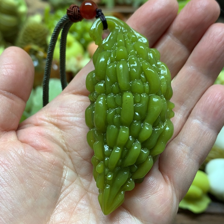 蛇纹石玉手把件合金