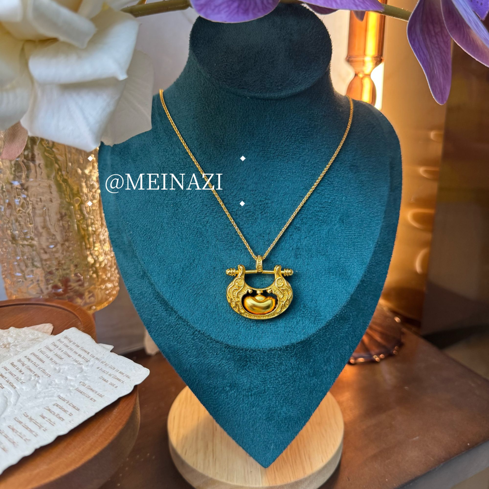 MEINAHUI/旋转元宝锁包X00181