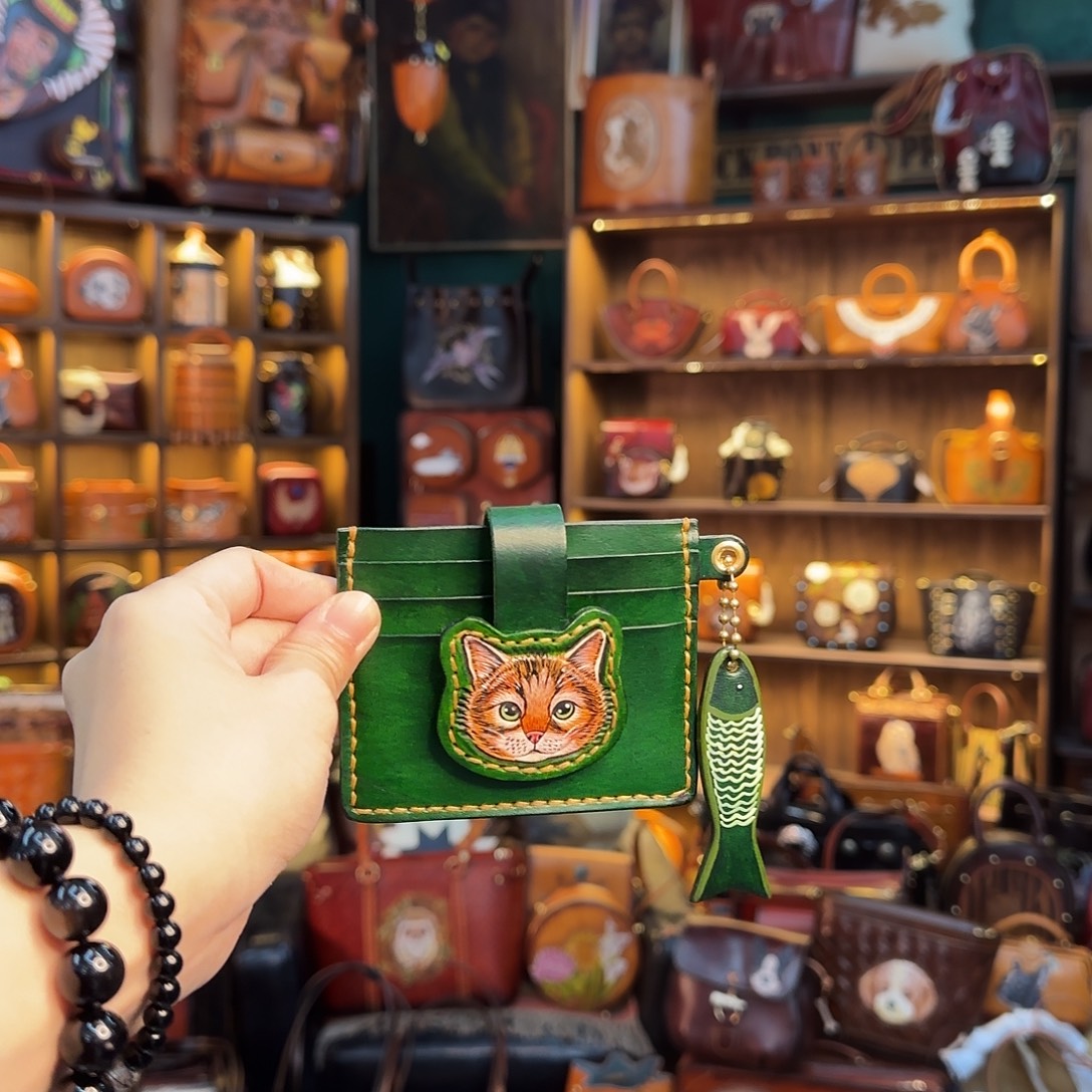 薄***荷牦牛剖层皮革墨绿色奶猫卡包