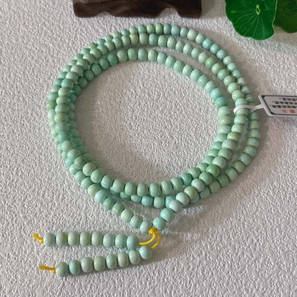 2800天然绿松石老型多圈约5mm，重量含签约28.4g，长约70cm