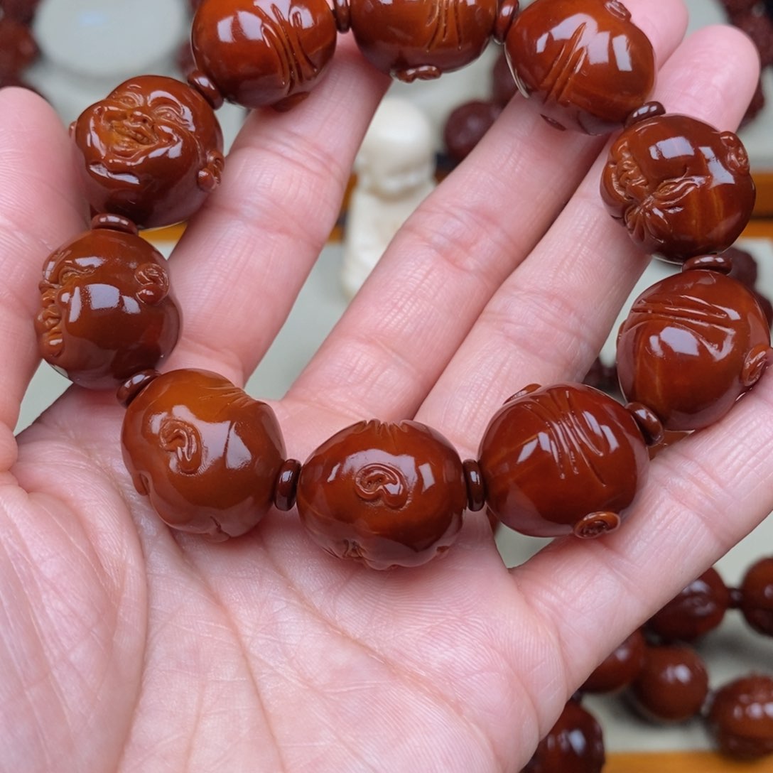 橄榄核吊坠人生百态