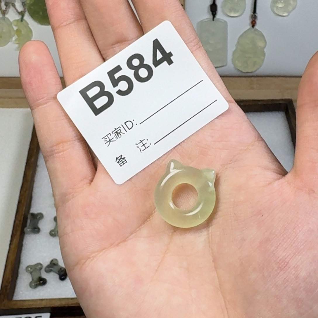 蛇纹石玉吊坠未镶嵌番***卷