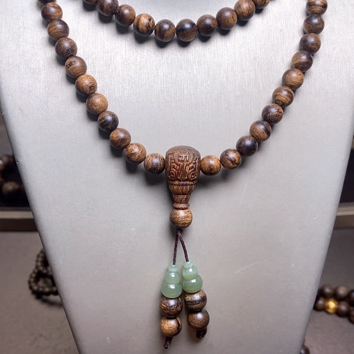 沉香手串越南帝王限量金丝瘤疤富森红土0.6➕沉香木雕