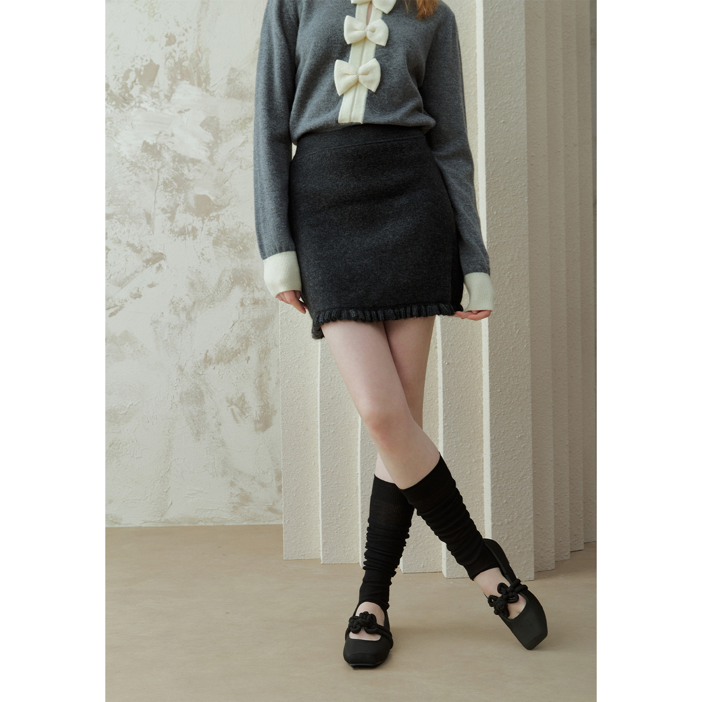 奥芝国甜美复古木耳边裙摆显瘦A字短裙女秋冬4色短款针织半身裙