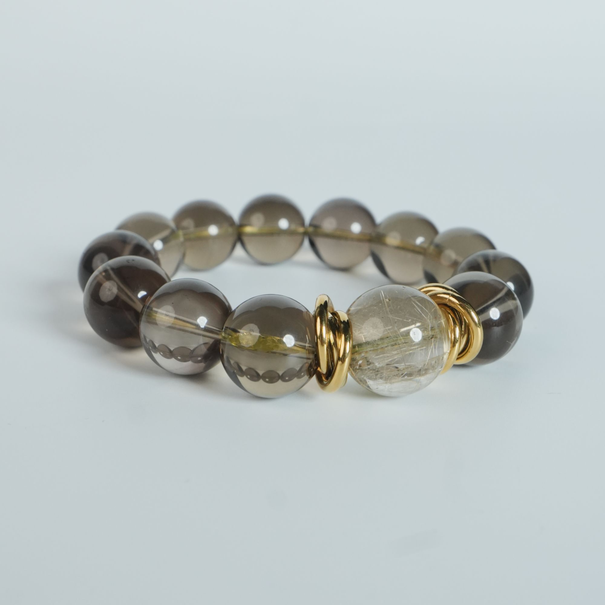 DY-M4543 金发晶+茶晶手串 62.14g