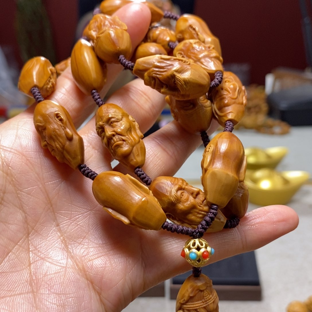 橄榄核吊坠陌***路橄榄树