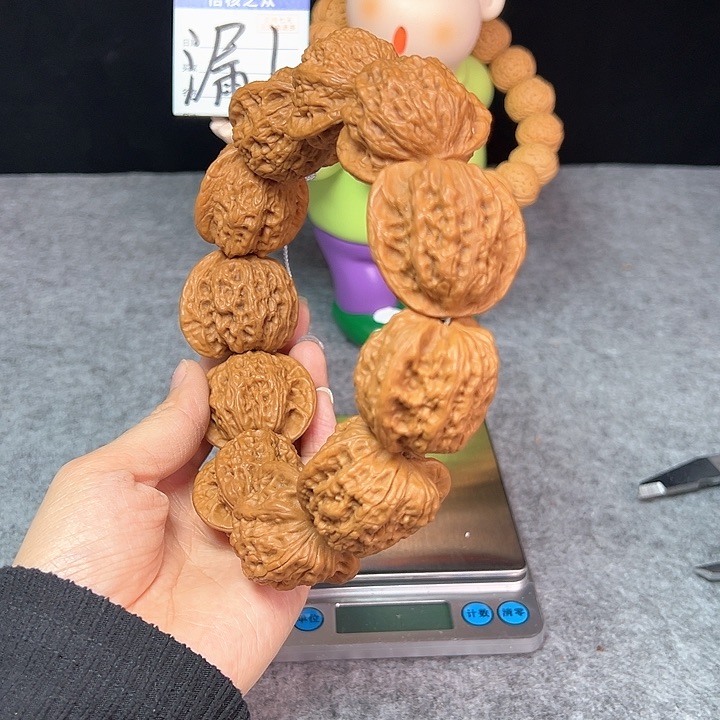 文玩核桃把件崔凯手持