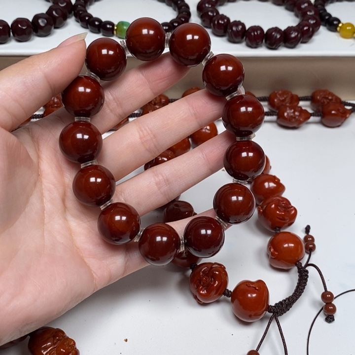 晗***缀橄榄核雕刻工艺的发展