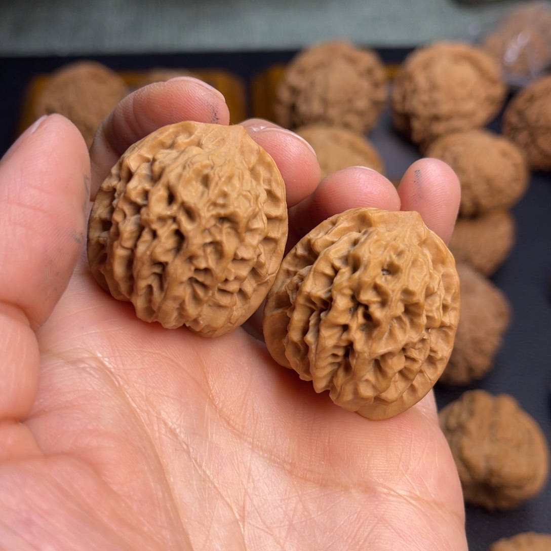 桃核把件31全品秦闷。孟