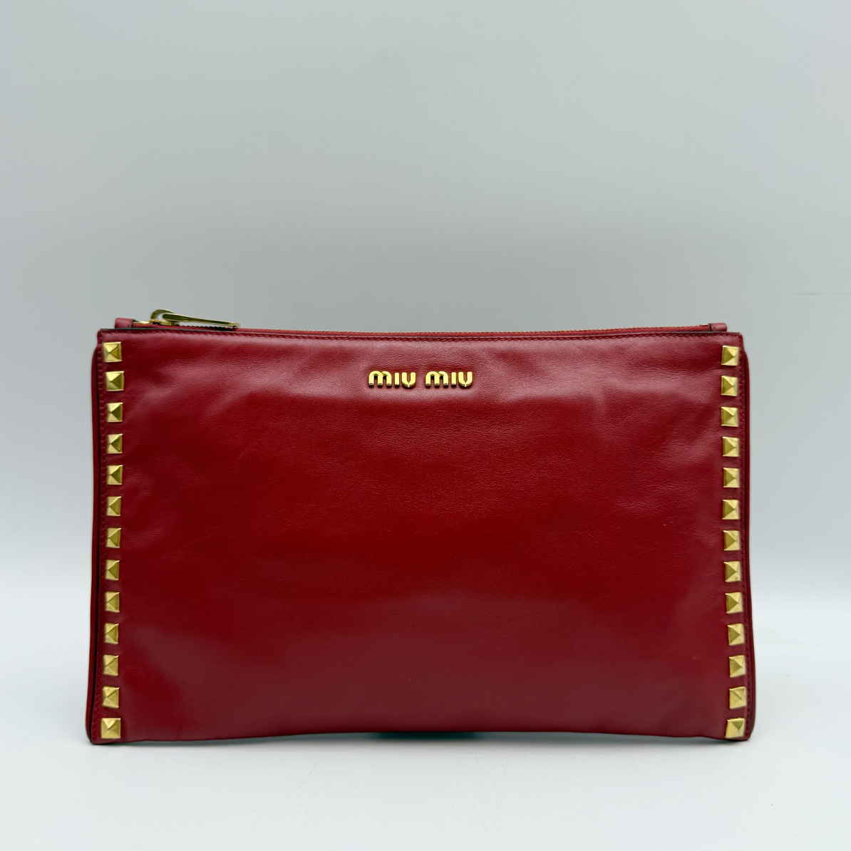 95新 MIU MIU/缪缪 红色铆钉手拿包、手包41397