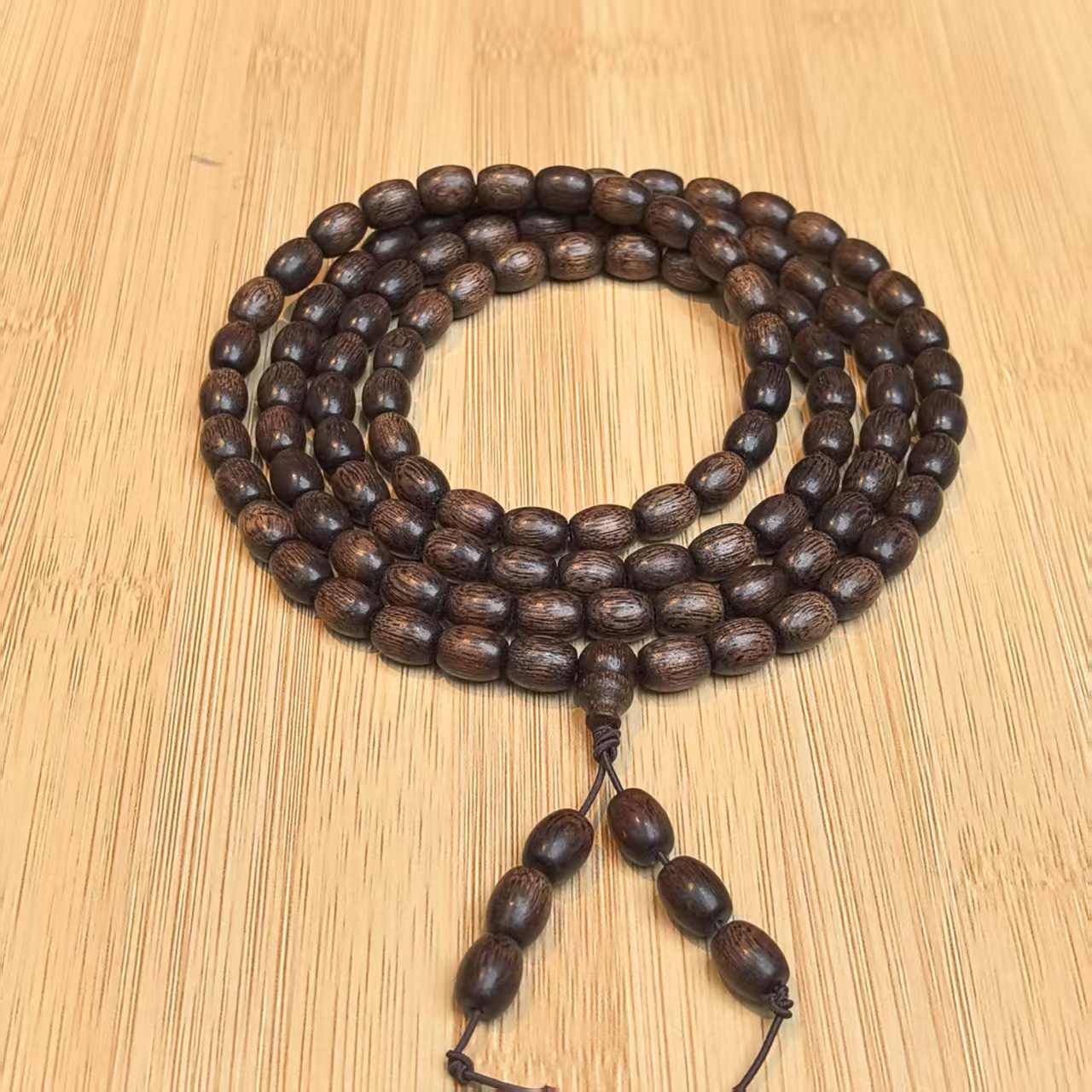 B015【鼎尊】紫奇鹧鸪纹鼓珠沉香108多圈手串