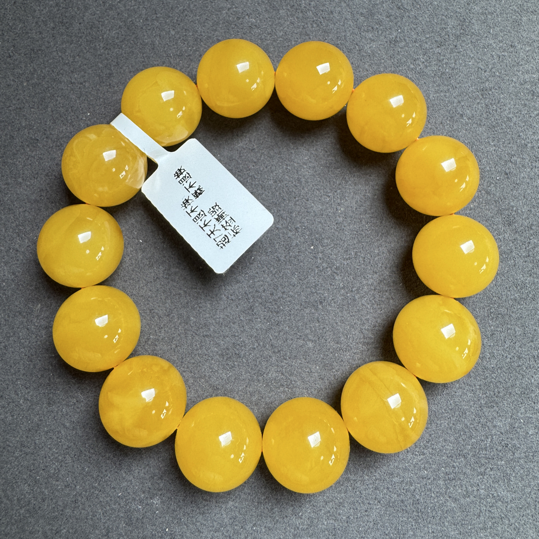 精品焦皮料满蜜鸡油红手串