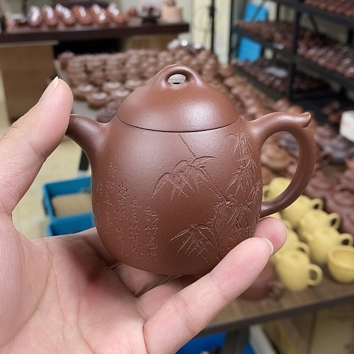 紫砂茶杯秦权刻绘