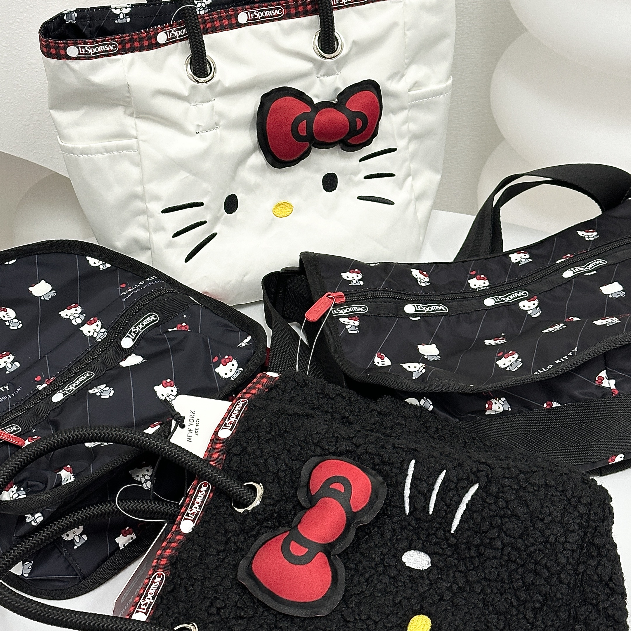 le萝卜LE满印凯蒂猫手提斜挎包可爱卡通毛绒手提包包