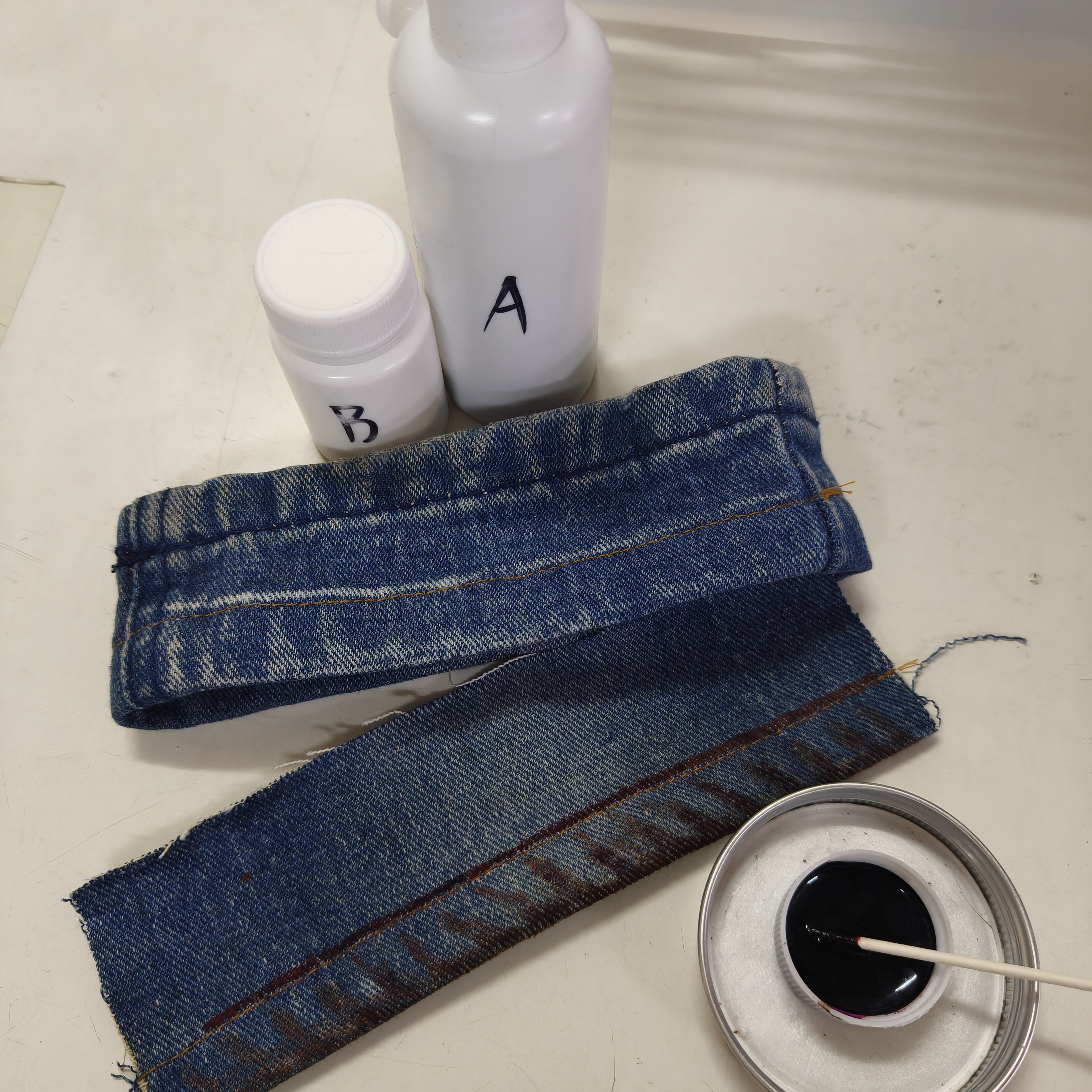 牛仔裤水洗原边褪色剂