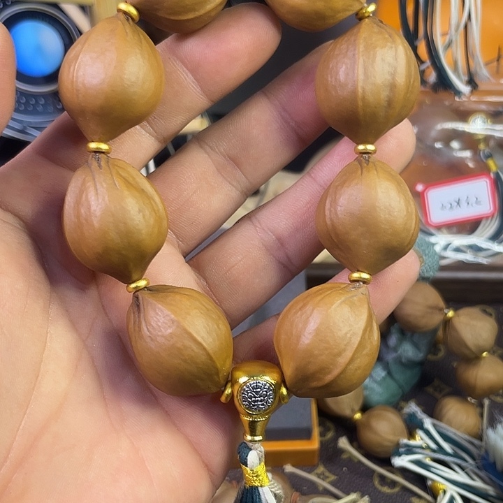 橄榄核手串梅林黄胖