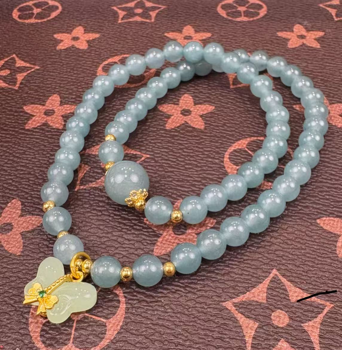 手链 S1283-海盐蓝0.6双圈石英岩压制转运蝴蝶挂饰 