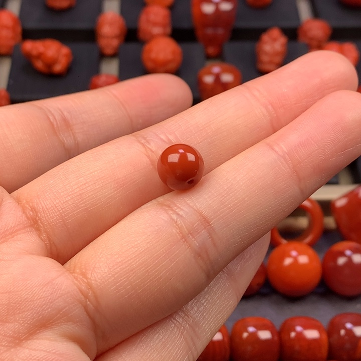 蒋***焕南红玛瑙未镶嵌圆珠单珠8.5MM