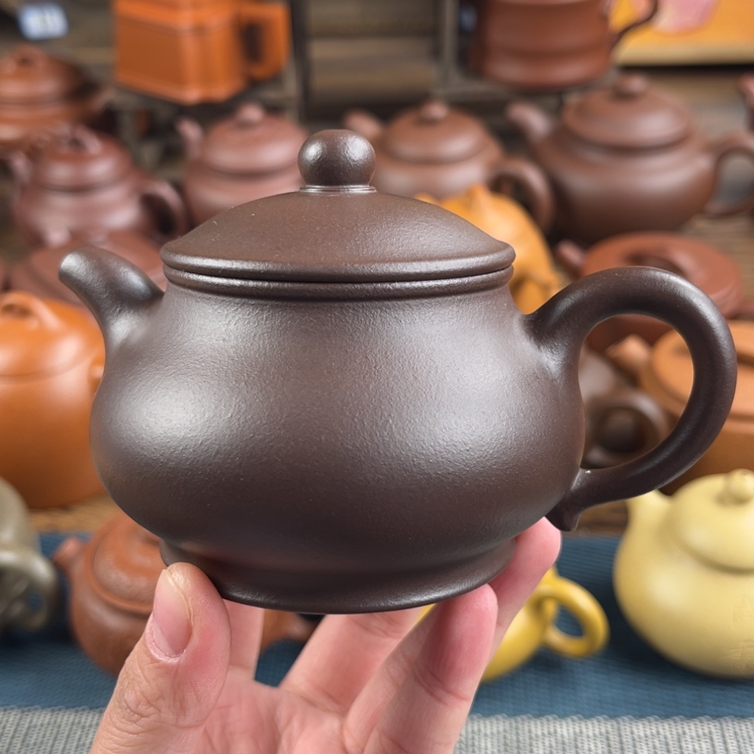一***花紫砂茶壶手工制作工艺精湛