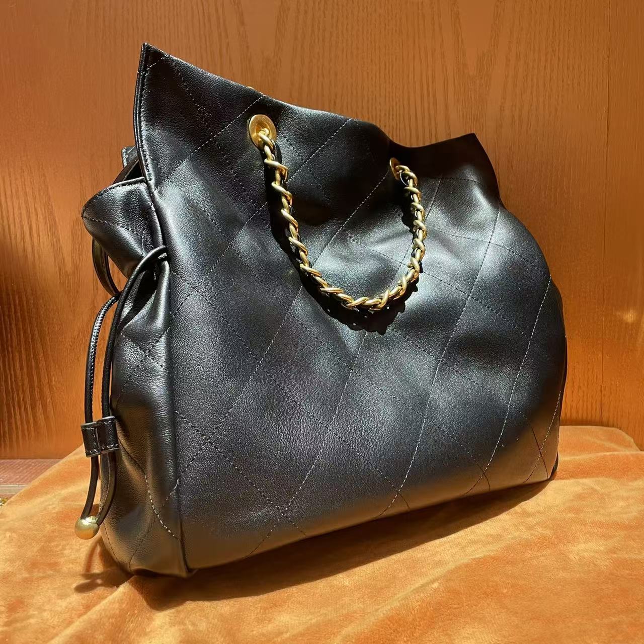 HIRMRIS手工真皮包30-551118-黑--双手提福香 抽绳小金珠