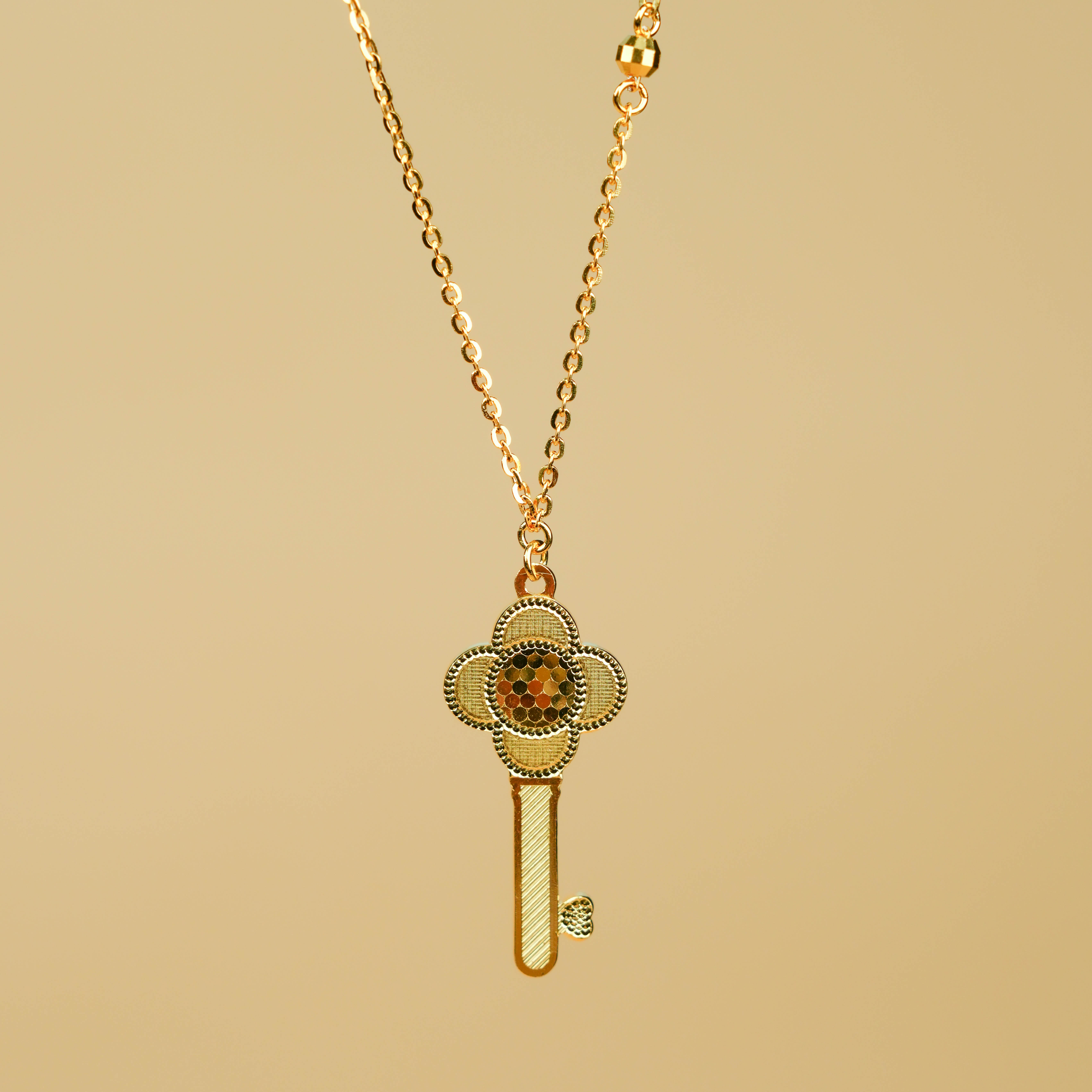 坠链均足银 足银太阳花钥匙套链金色时尚