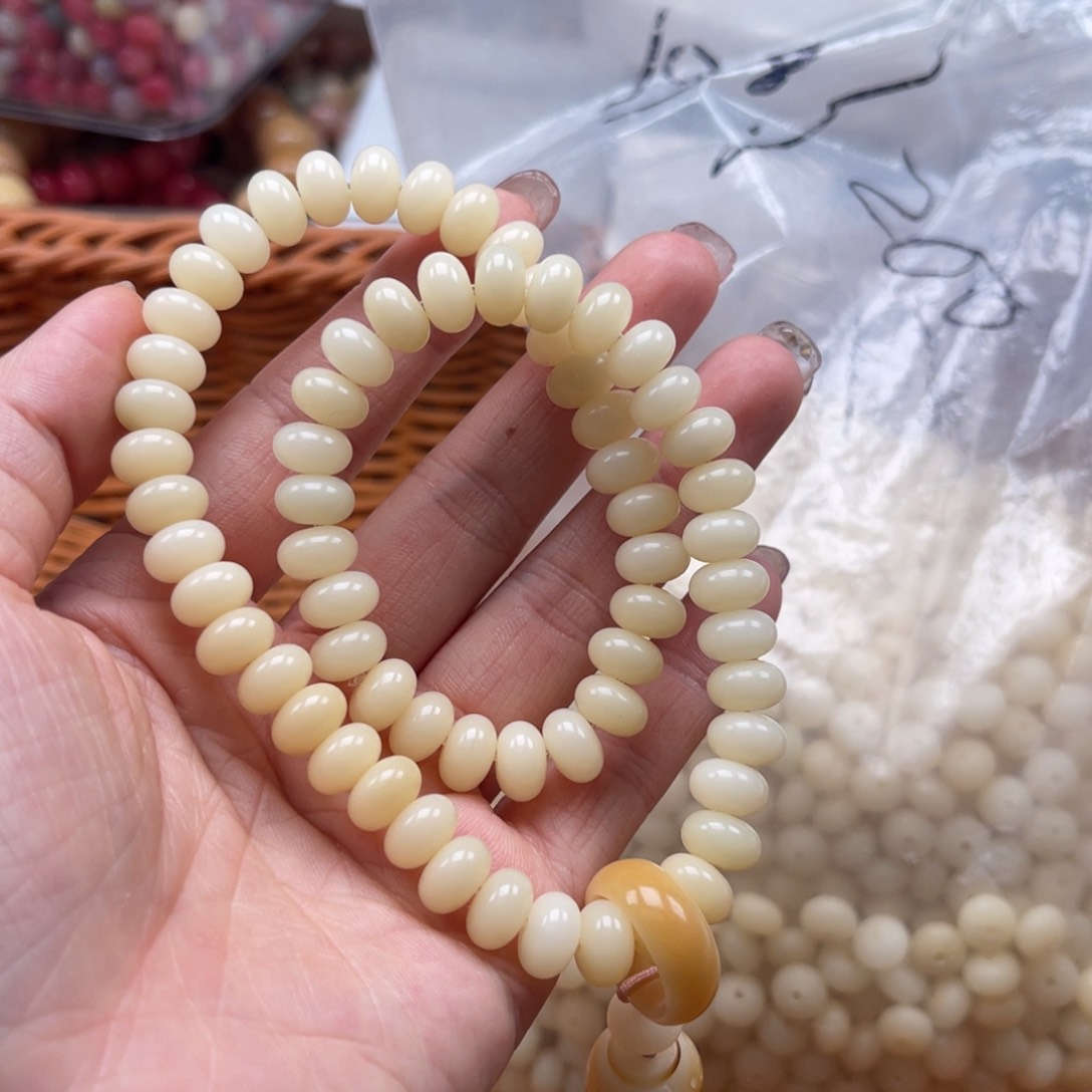 吊坠白玉菩提p x05/9mm/150颗米黄色算盘瑕